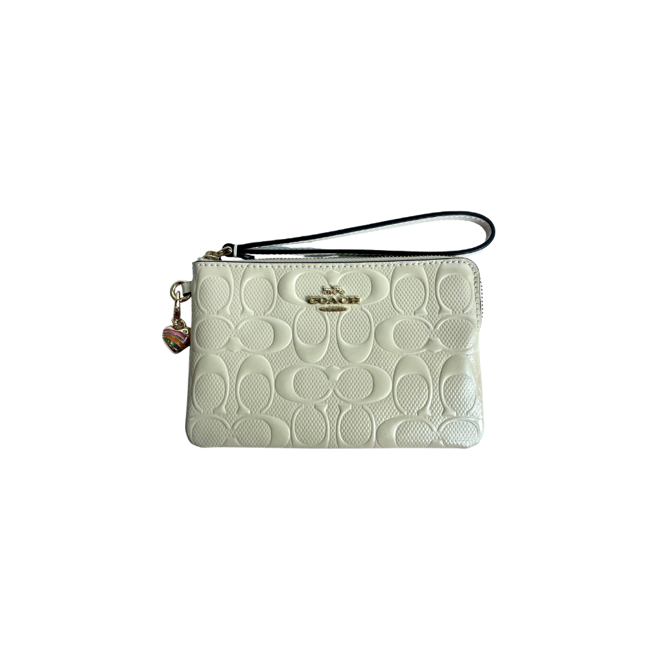 Coach cartera muñequera pequeña beige ...